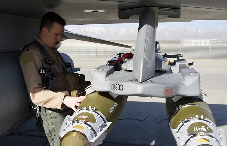 “Slapshot”, 77th Expeditionary Fighter Squadron F-16 Fighting Falcon fighter pilot, pre-checks his aircraft prior to taking off Feb. 9, 2018 at Bagram Airfield, Afghanistan.