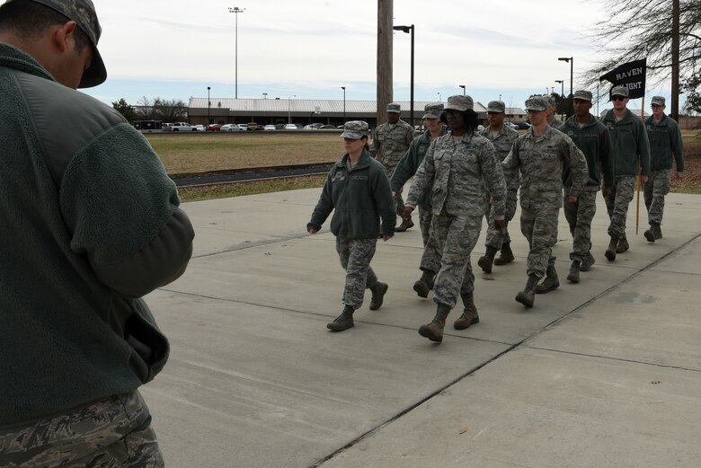 U.S. Air Force Staff Sgt. Abelino Ledesma, Senior Master Sgt. David B. Reid Airman Leadership School (ALS) instructor, critiques his students practicing drill movements at Shaw Air Force Base, S.C., Feb. 2, 2018.