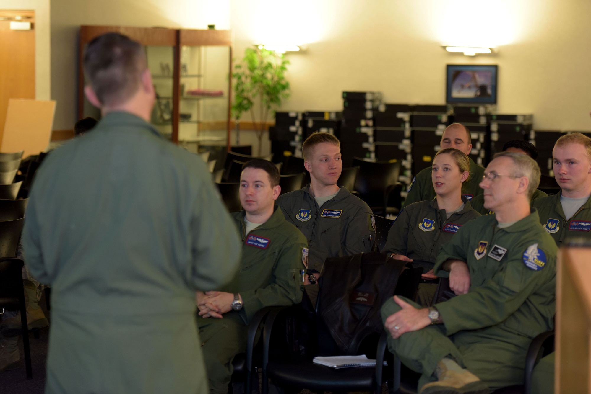Airmen ask questions during a career enlisted aviator roadshow briefing at RAF Mildenhall, England, Feb. 8, 2018.  The question and answer session was one of three briefings during the senior enlisted leaders’ visit to discuss issues and programs pertaining to the CEA career fields. (U.S. Air Force photo by Senior Airman Alexandra West)