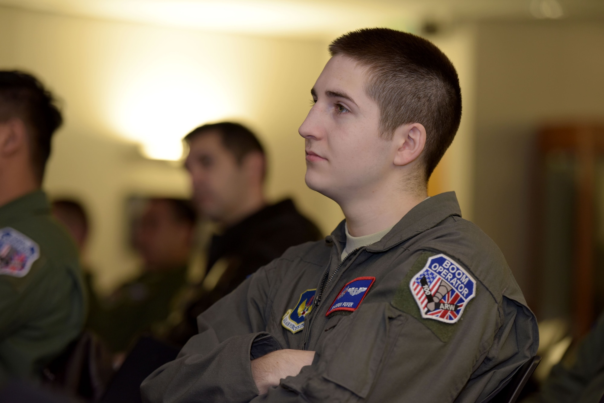 U.S. Air Force Senior Airman Derek Peifer, 351st Air Refueling Squadron boom operator, listens to senior enlisted leaders from the career enlisted aviator career field at RAF Mildenhall, Feb. 8, 2018. The briefings discussed CEA retention issues, incentive programs and cross-training opportunities for Airmen interested in the CEA career fields. (U.S. Air Force photo by Senior Airman Alexandra West)