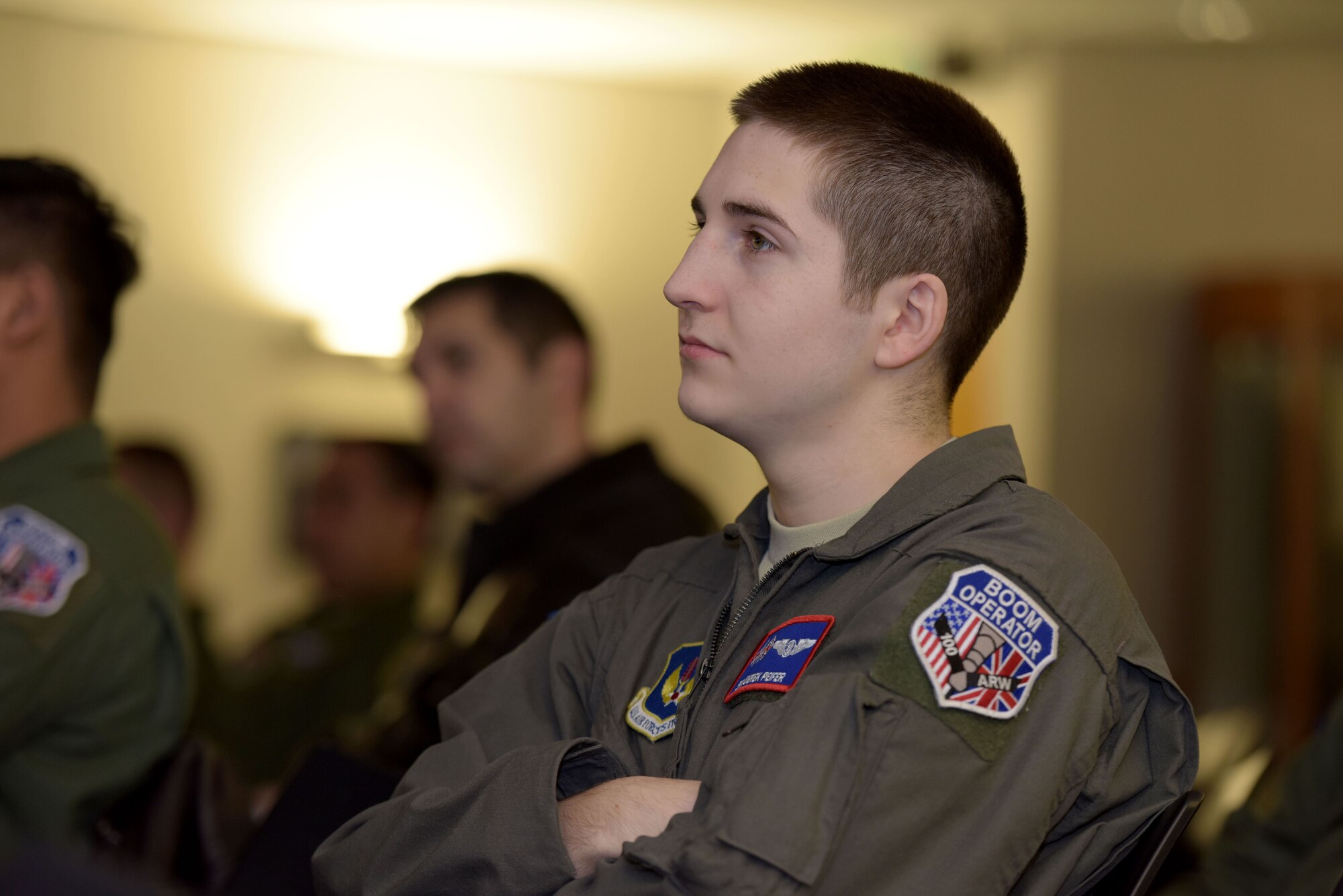 U.S. Air Force Senior Airman Derek Peifer, 351st Air Refueling Squadron boom operator, listens to senior enlisted leaders from the career enlisted aviator career field at RAF Mildenhall, Feb. 8, 2018. The briefings discussed CEA retention issues, incentive programs and cross-training opportunities for Airmen interested in the CEA career fields. (U.S. Air Force photo by Senior Airman Alexandra West)