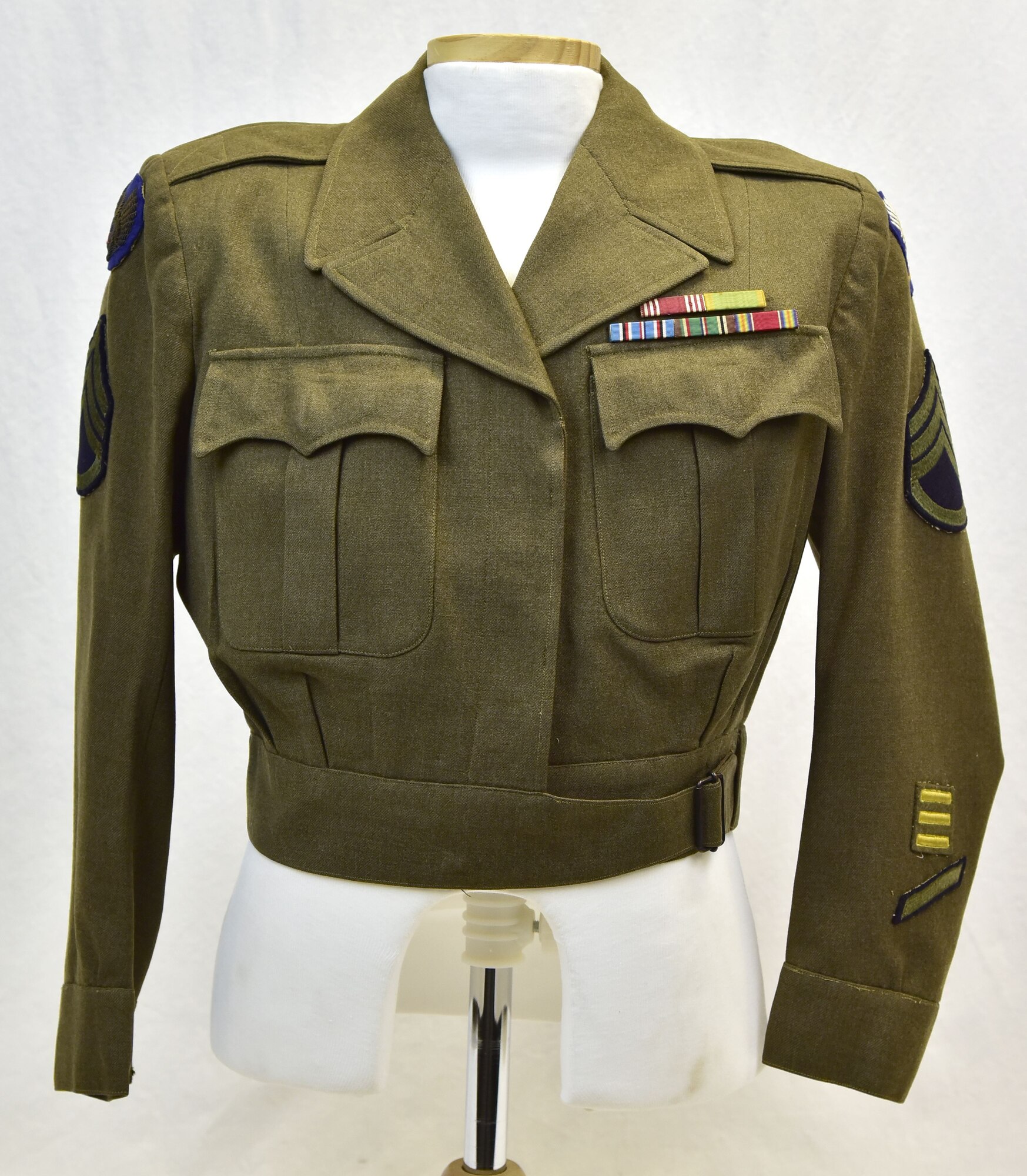 Plans call for this artifact to be displayed near the B-17F Memphis Belle™ as part of the new strategic bombardment exhibit in the WWII Gallery, which opens to the public on May 17, 2018. Coat worn by SSgt Theresa Kobuszewski, who served in the Women’s Army Corps in the Eighth and Ninth Air Forces in England during WWII.