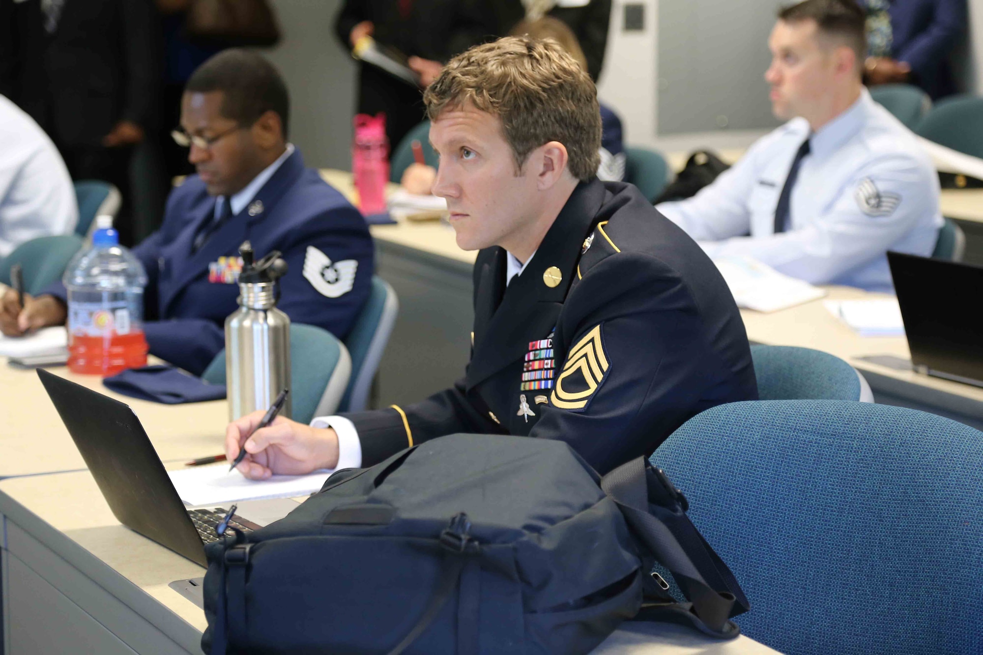 Army Sgt. 1st Class Joshua Richter listens to a lecture at George Mason University-Prince William Campus, Manassas, Va., as a student in the Uniformed Services University of the Health Sciences’ Enlisted to Medical Degree Preparatory Program in 2014. Richter, now an Army second lieutenant in his second year of medical studies at USU, was among the first 10 enlisted members accepted into EMDP2 program.