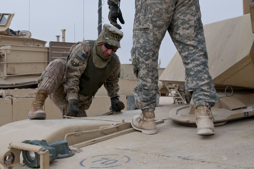 AFCENT Commander Boards M-1 Abrams Tank