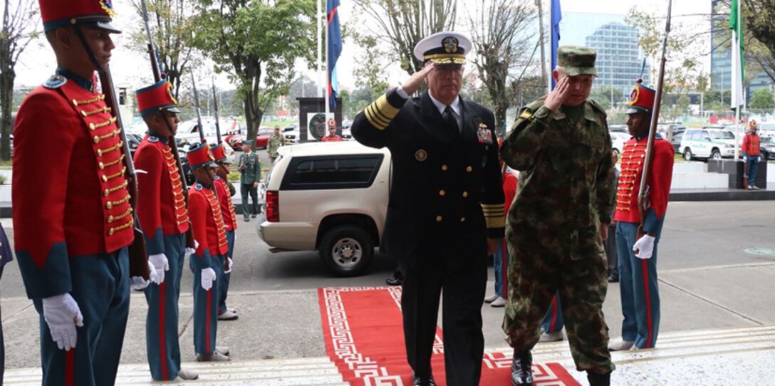 Military leaders salute.