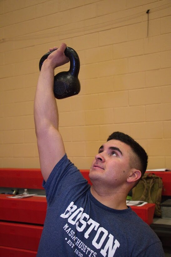 Lance Cpl. David Hawes, administrative clerk, S1, Headquarters and Service Battalion, U.S. Marine Corps Forces Command, takes part in a kettle bell workout during the High Intensity Tactical Training Level I instructor course at Hopkins Hall Gym aboard Camp Allen, in Norfolk, Va., Feb. 7. During this four-day course, the HITT Level I instructor course coordinators taught Marines proper techniques for various workouts, safety measures, nutrition, and how to plan their own HITT workouts . (Official Marine Corps photo by Sgt. Mark Tuggle/Released)