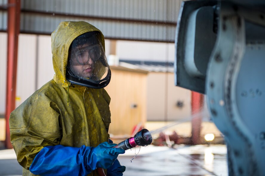 Senior Airman Michael Atkinson, 74th Aircraft Maintenance Unit dedicated crew chief, sprays the side of an A-10C Thunderbolt II, Feb. 8, 2018, at Moody Air Force Base, Ga. In addition to mechanical and electrical maintenance, A-10’s must be washed every 180 days or approximately 1,000 flying hours in order to control corrosion caused by residue from the gun and engine exhaust. (U.S. Air Force photo by Senior Airman Janiqua P. Robinson)