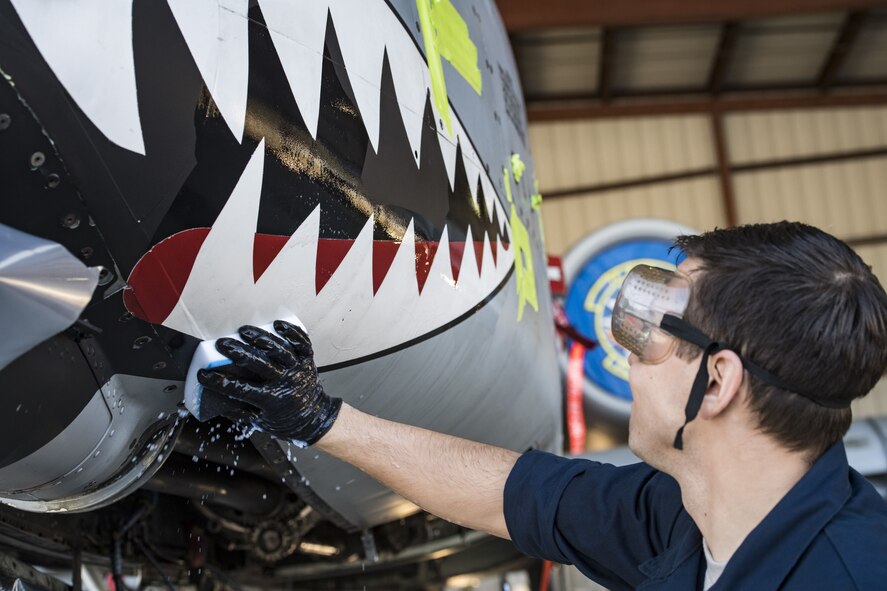 Senior Airman Michael Atkinson, 74th Aircraft Maintenance Unit dedicated crew chief, washes the teeth on an A-10C Thunderbolt II, Feb. 8, 2018, at Moody Air Force Base, Ga.
In addition to mechanical and electrical maintenance, A-10’s must be washed every 180 days or approximately 1,000 flying hours in order to control corrosion caused by residue from the gun and engine exhaust. (U.S. Air Force photo by Senior Airman Janiqua P. Robinson)