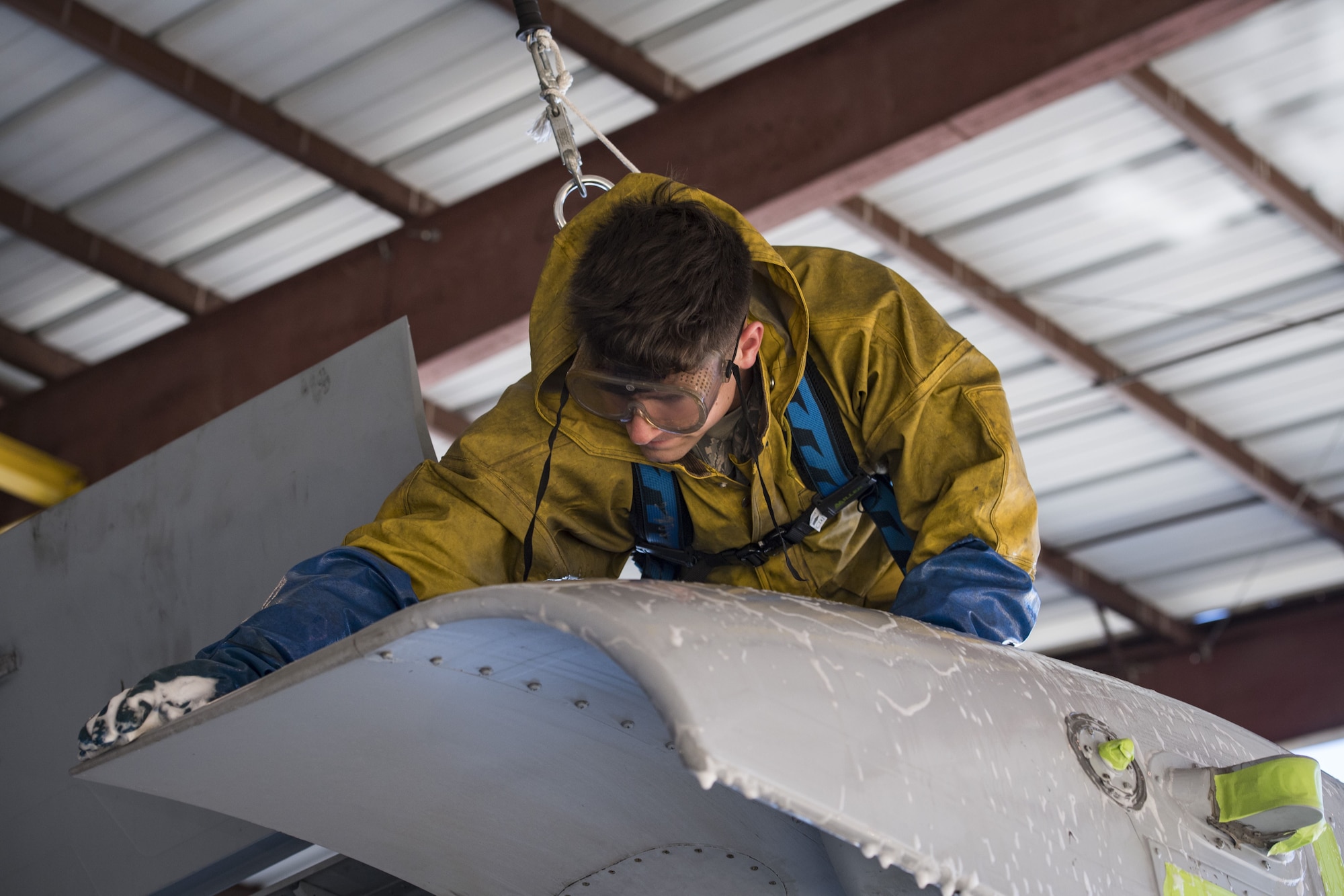 Airman 1st Class Jake Dromgold, 74th Aircraft Maintenance Unit crew chief, washes the wing of an A-10C Thunderbolt II, Feb. 8, 2018, at Moody Air Force Base, Ga. In addition to mechanical and electrical maintenance, A-10’s must be washed every 180 days or approximately 1,000 flying hours in order to control corrosion caused by residue from the gun and engine exhaust. (U.S. Air Force photo by Senior Airman Janiqua P. Robinson)