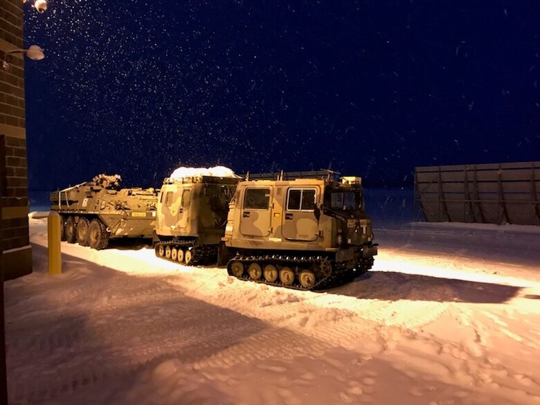 Airmen assigned to the 821st Contingency Response Group and Soldiers assigned to U.S. Army Alaska, conduct a joint inspection for airlift on Small Unit Support Vehicles and Stryker Combat Vehicles during the Rapid Alaskan Airlift Week exercise at Eielson Air Force Base, Alaska, Jan. 19 through 26. The week-long exercise is designed to optimize exercise opportunities in a cold weather environment for mobility Airmen and allow for sharing of tactics, techniques and procedures across the Joint Force. (Courtesy photo)