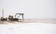 Airmen firing machine gun