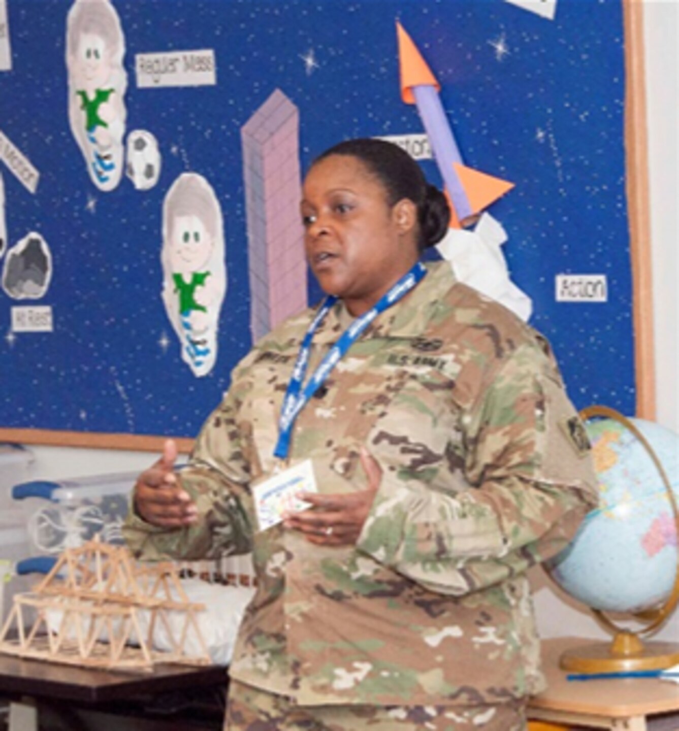 TAM Deputy LTC Taneha Carter discussing engineering and STEM with a group of fifth grade students during their week of exploration and learning at STARBASE Academy, Winchester.