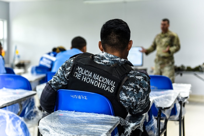U.S. soldier teaches a class for Honduran police officers.