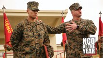 Sgt. Maj. Jeffery Vandentop, right, battalion sergeant major of 3rd Transportation Support Battalion, 3rd Marine Logistics Group, speaks about Sgt. Heriberto Navarro's achievements to the battalion at Camp Foster, Okinawa, Japan, Feb. 8, 2018. Navarro, the supply chief of Headquarters and Service Company, 3rd TSB, 3rd MLG, was honored as III Marine Expeditionary Force’s Noncommissioned Officer of the Year. Navarro won the award for being exemplary in his duties, which included managing roughly $250,000 worth of inventory and equipment during Korean Marine Exchange Program 18.1, as well as his performance as 3rd TSB’s color sergeant and his daily demonstration of the Marine Corps' core values. Navarro is a native of Pico Rivera, California. (U.S. Marine Corps photo by Sgt. Tiffany Edwards)