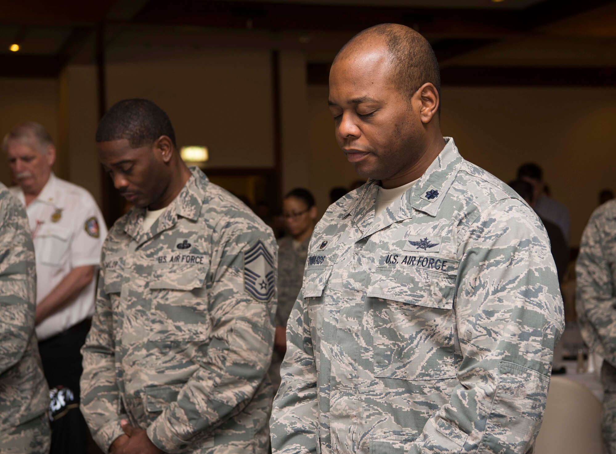 Team Ramstein members participate in the National Prayer Breakfast on Ramstein Air Base, Germany, Feb. 13, 2018. The breakfast celebrates the freedom of religion recognized in the First Amendment of the U.S. Bill of Rights upon its ratification on December 15, 1791. The First Amendment protects each individual's freedom to practice a religion of their choice, and prevents the government from favoring any particular religion. (U.S. Air Force photo by Senior Airman Elizabeth Baker)