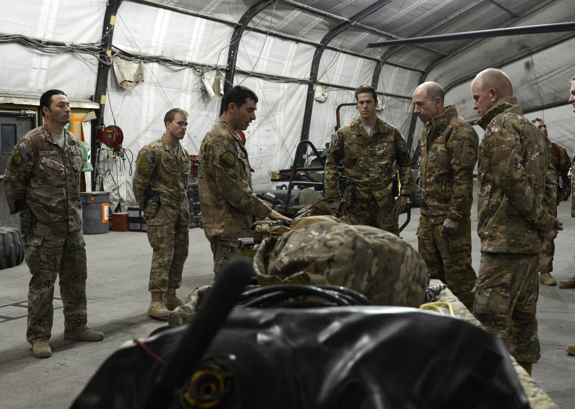 Gen. Mike Holmes, commander of Air Combat Command, and Chief Master Sgt. Frank Batten, ACC command chief, visits Airmen from the 83rd Expeditionary Rescue Squadron Feb. 9, 2018 at Bagram Airfield, Afghanistan.