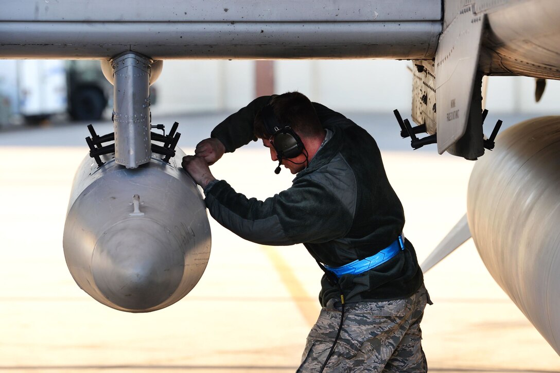 An airman performs a preflight inspection on an A-10C Thunderbolt II.