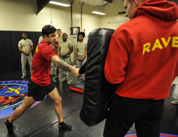 Staff Sgt. George Carty, 628th Security Forces Squadron Phoenix Raven, demonstrates proper striking techniques to Phoenix Raven candidates Jan. 31, 2018, at Joint Base Charleston, S.C.
