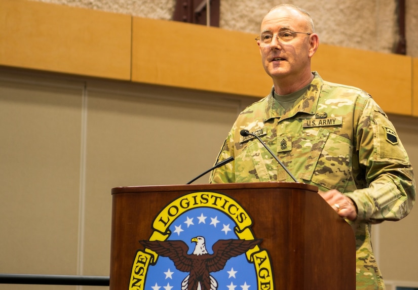 The 80th Training Command's outgoing senior leader Command Sgt. Maj. Jeffrey Darlington says goodbye at the command's change of responsibility ceremony held at the Defense Supply Center Richmond, Virginia, during the 80th TC Commander's Readiness Workshop Feb. 8, 2018.  At the ceremony, Darlington handed over the reins to the incoming senior leader Command Sgt. Maj. Dennis Thomas. (U.S. Army Reserve Photo by Maj. Addie Leonhardt)