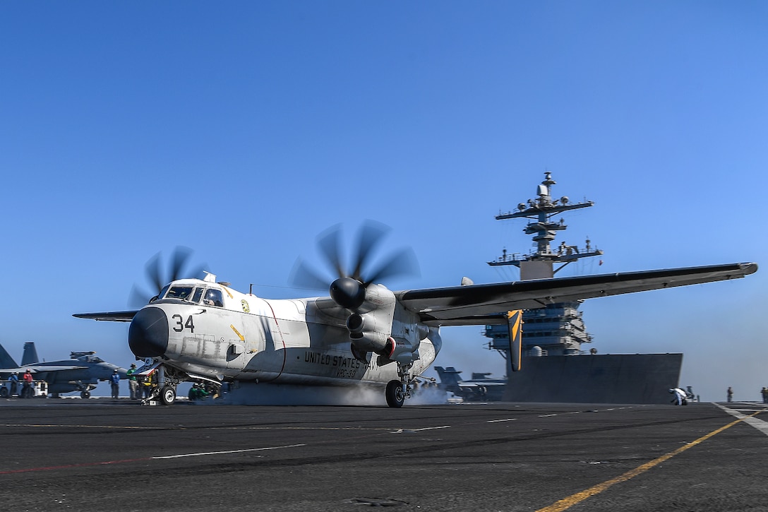 A C-2A Greyhound aircraft takes off from the flight deck of the aircraft carrier USS Theodore Roosevelt.