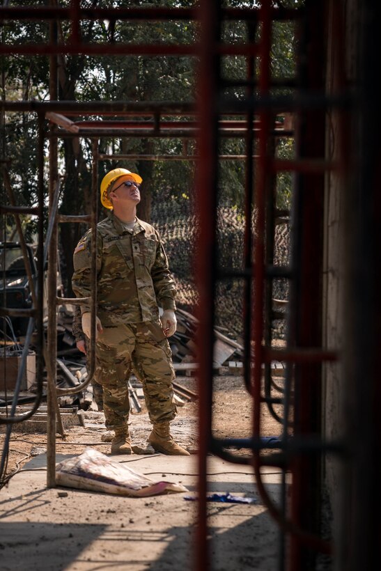U.S. Army Spc. Todd Fedele surveys a construction site of a school building in support of Exercise Cobra Gold 2018 at Nongphipadungkhitwittaya School in Korat, Kingdom of Thailand, Feb. 7, 2018. Fedele is an electrician with 797th Engineering Company, 411th Engineer Battalion, and is a native of Yigo, Guam. Humanitarian civic assistance projects conducted during the exercise support the needs and humanitarian interests of the Thai people. Cobra Gold 18 is an annual exercise conducted in the Kingdom of Thailand held from Feb. 13-23 with seven full participating nations.
