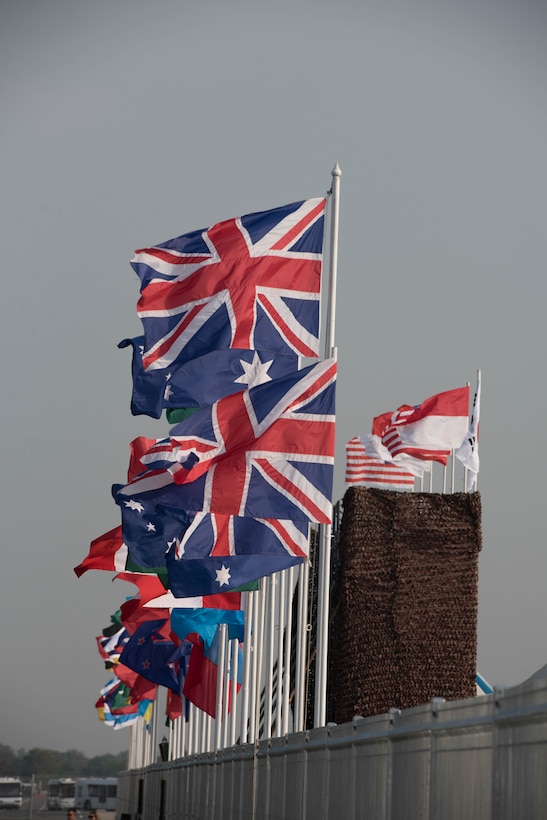 Flags from multiple nations participating in or observing Exercise Cobra Gold 2018 are flown during the opening ceremony Feb. 13, 2018, at U-Tapao International Airport, Ban Chang district, Rayong province, Thailand. Cobra Gold 18 provides a venue for both United States and partner nations to advance interoperability and increase partner capacity in planning and executing complex and realistic multinational force and combined task force operations. The annual exercise is conducted in the Kingdom of Thailand held from Feb. 13-23 with seven full participating nations.
