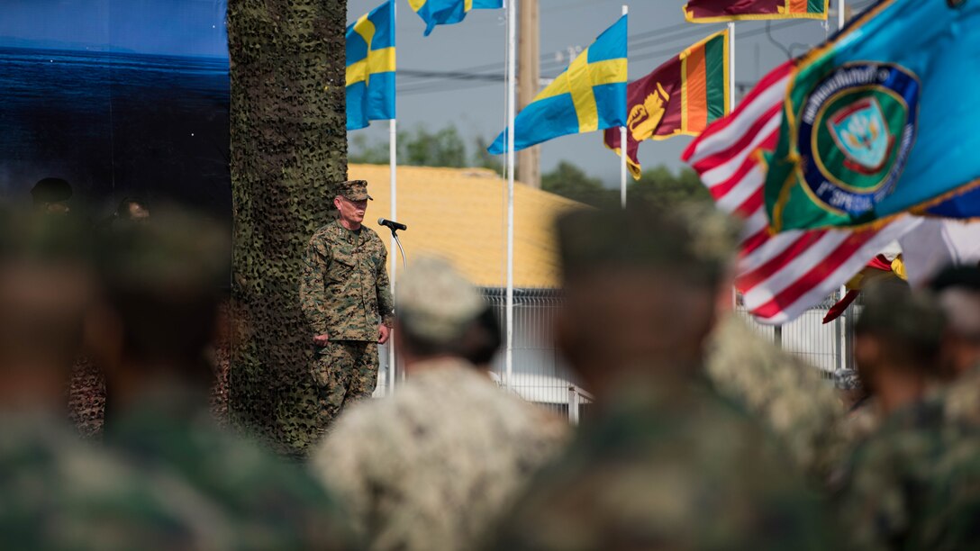 U.S. Marine Corps Lt. Gen. Lawrence Nicholson, III Marine Expeditionary Force commanding general, addresses forces from all seven participating nations in Exercise Cobra Gold 2018 during the opening ceremony Feb. 13, 2018, at U-Tapao International Airport, Ban Chang district, Rayong province, Thailand. Exercise Cobra Gold, in its 37th iteration, is designed to advance regional security and ensure effective responses to regional crises by bringing together a robust multinational force to address shared goals and security commitments in the Indo-Pacific region. The annual exercise is conducted in the Kingdom of Thailand held from Feb. 13-23 with seven full participating nations.