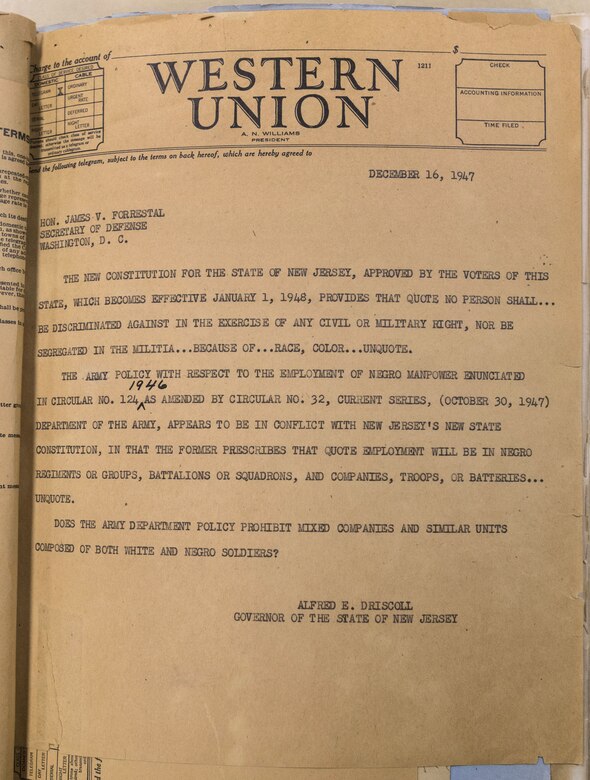 Telegram sent from New Jersey Governor Alfred E. Driscoll to James V. Forrestal, Secretary of Defense on Dec. 16, 1947, asking: “Does the Army Department Policy prohibit mixed companies and similar units composed of both white and negro soldiers?” New Jersey had passed a new constitution in 1947 that ended segregation in the New Jersey National Guard. Army policy at the time prohibited racially mixed units. (New Jersey National Guard photo by Mark C. Olsen)