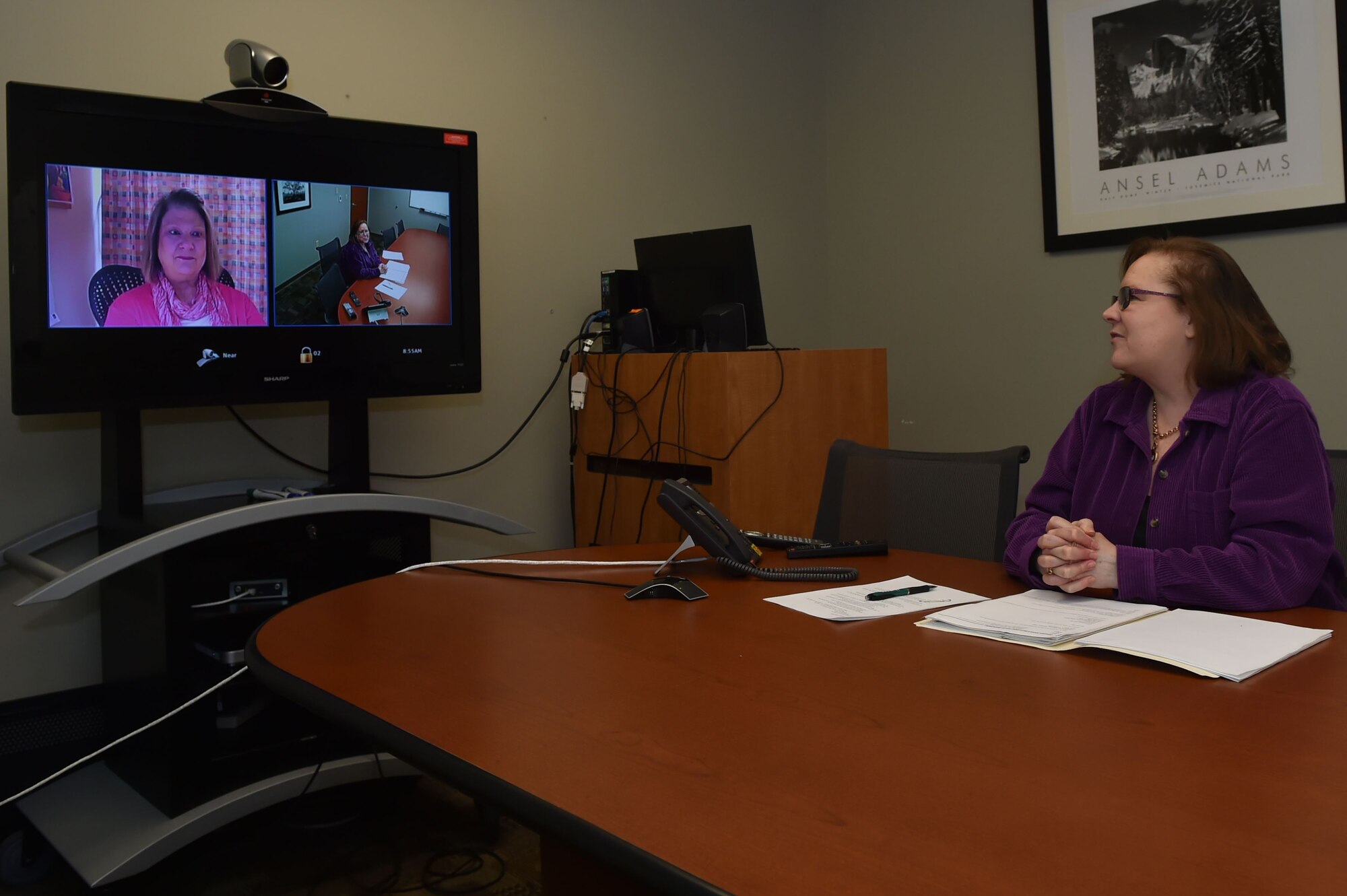 Gayle Kenyon, health promotion coordinator assigned to the 97th Medical Group, has a video tele-conference with Ann Elkins, clinical dietitian assigned to the 412th Medical Group, discussing the progress of the new tele-medical nutrition therapy program