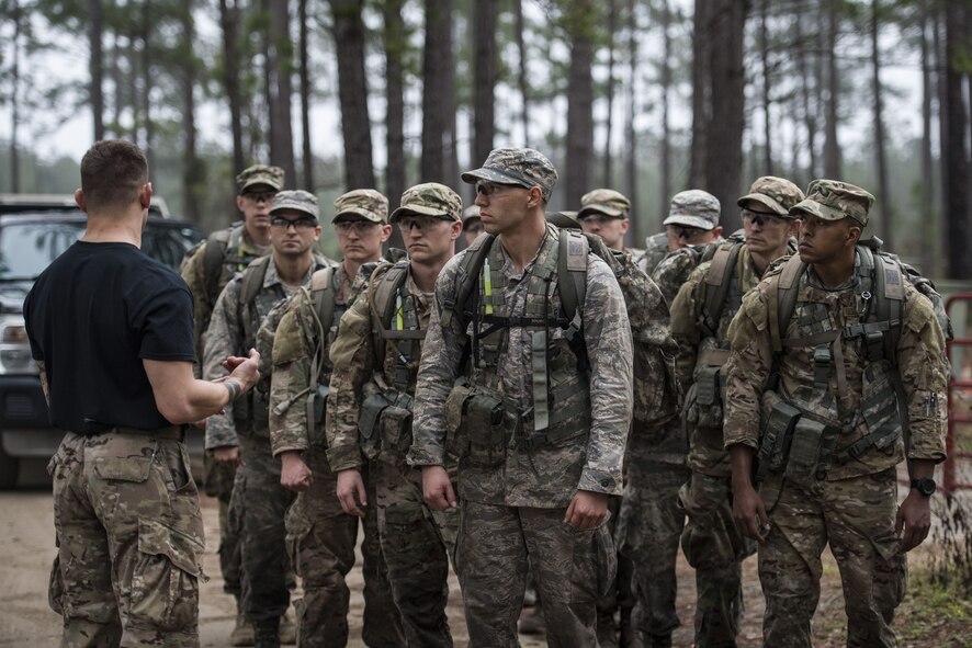A Ranger addresses Airmen after a land navigation challenge during a Pre Ranger Assessment Course, Feb. 10, 2018, at Moody Air Force Base, Ga. The three-day assessment is designed to determine whether Airmen are ready to attend the Air Force Ranger Assessment Course held at Fort Bliss Army Post, Texas. Ranger cadre test Airmen’s physical fitness, tactical abilities, land navigation skills, leadership qualities, water confidence and academic ability to determine if they have the knowledge and will to become Rangers. (U.S. Air Force photo by Senior Airman Janiqua P. Robinson)