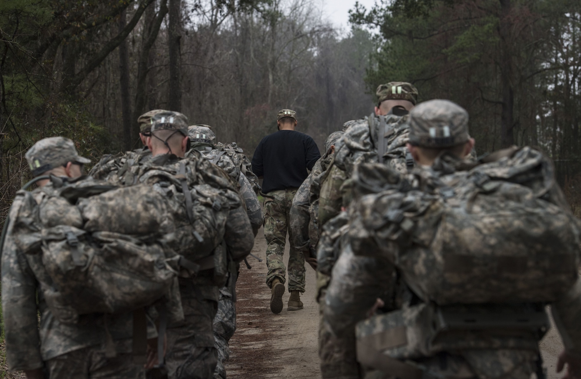 Airmen follow a Ranger during a Pre Ranger Assessment Course, Feb. 10, 2018, at Moody Air Force Base, Ga. The three-day assessment is designed to determine whether Airmen are ready to attend the Air Force Ranger Assessment Course held at Fort Bliss Army Post, Texas. Ranger cadre test Airmen’s physical fitness, tactical abilities, land navigation skills, leadership qualities, water confidence and academic ability to determine if they have the knowledge and will to become Rangers. (U.S. Air Force photo by Senior Airman Janiqua P. Robinson)