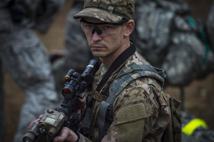 An Airmen provides security during a Pre Ranger Assessment Course, Feb. 11, 2018, at Moody Air Force Base, Ga.The three-day assessment is designed to determine whether Airmen are ready to attend the Air Force Ranger Assessment Course held at Fort Bliss Army Post, Texas. Ranger cadre test Airmen’s physical fitness, tactical abilities, land navigation skills, leadership qualities, water confidence and academic ability to determine if they have the knowledge and will to become Rangers. (U.S. Air Force photo by Senior Airman Janiqua P. Robinson)