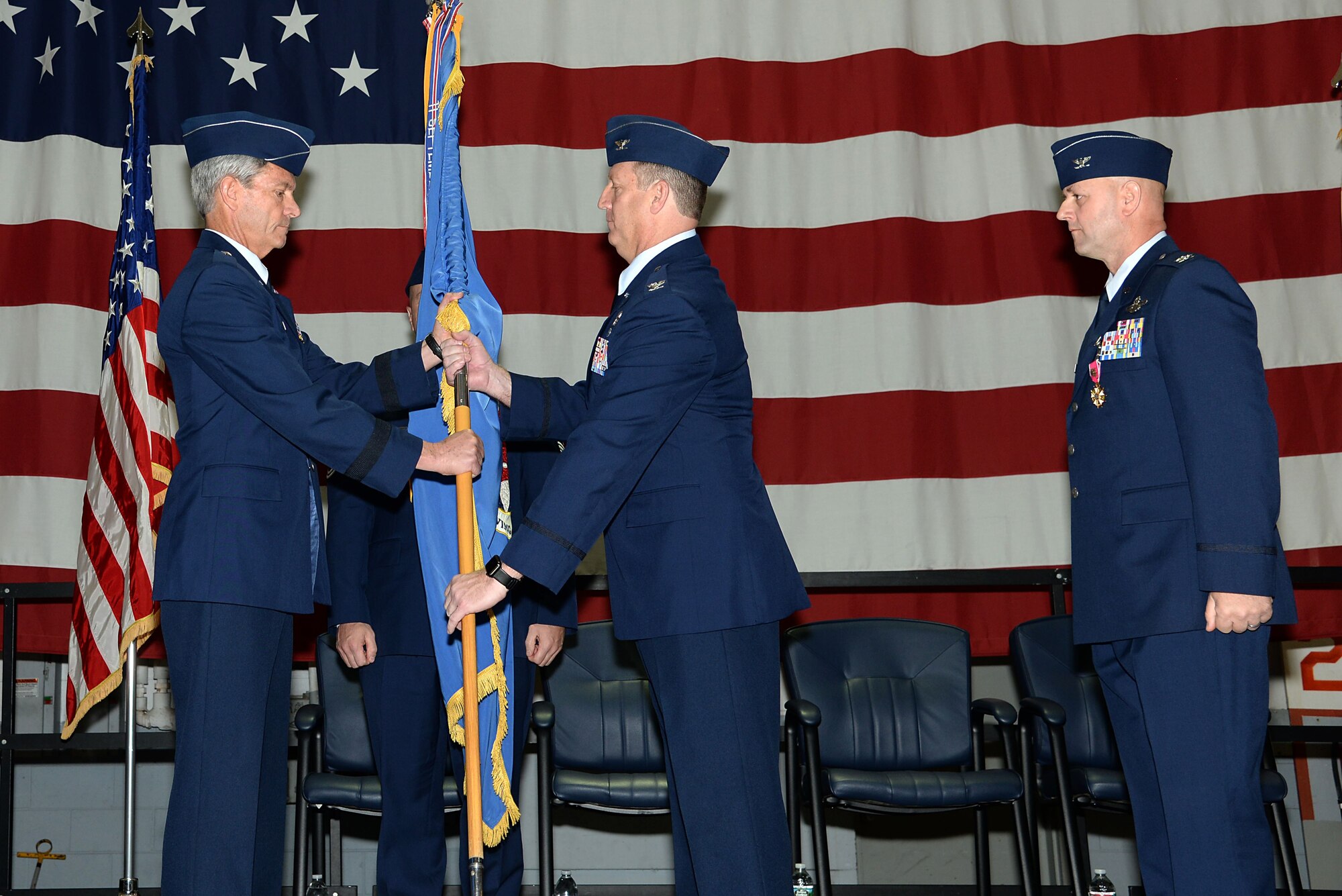 A picture of U.S. Air Force Col. Bradford R. Everman, the outgoing 177th Operations Group commander and future 177th Fighter Wing Commander, receiving the 177th FW guidon from Brig. Gen. Kevin J. Keehn, commander of the New Jersey Air National Guard.