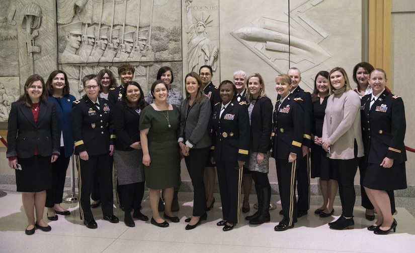 Female general officers and congressional staff delegates gather for a group photo after the Women Leadership Roundtable Discussion hosted at the Pentagon, Feb. 7, 2018. Top U.S. military generals met with congressional delegates to discuss their life perspectives as military women and the importance of having access to every talented American who can add strength to the force. (U.S. Army Reserve photo by Maj. Valerie Palacios)