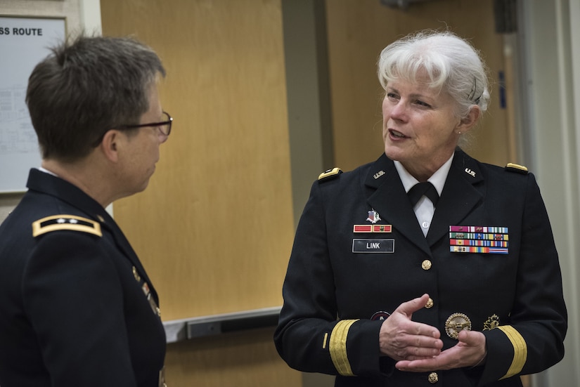 Maj. Gen. Mary Link, commanding general for Army Reserve Medical Command, speaks with Maj. Gen. Tammy Smith, assistant deputy chief of staff for Mobilization and Reserve Affairs before participating in the Women Leadership Roundtable Discussion, hosted at the Pentagon, Feb. 7, 2018. Top U.S. military generals met with congressional delegates to discuss their life perspectives as military women and the importance of having access to every talented American who can add strength to the force. (U.S. Army Reserve photo by Maj. Valerie Palacios)