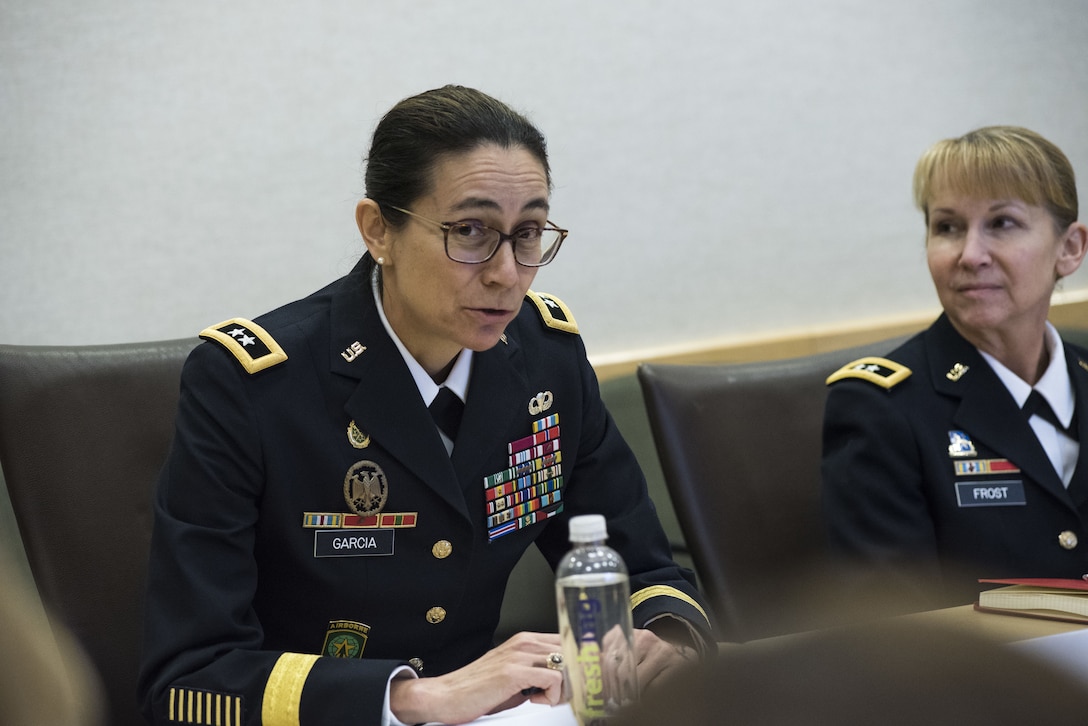 Maj. Gen. Marion Garcia, commanding general for the 200th Military Police Command, shares her experiences with congressional staff delegates and fellow general officers during the Women Leadership Roundtable Discussion hosted at the Pentagon, Feb. 7, 2018.  Top U.S. military generals met with congressional delegates to discuss their life perspectives as military women and the importance of having access to every talented American who can add strength to the force. (U.S. Army Reserve photo by Maj. Valerie Palacios)