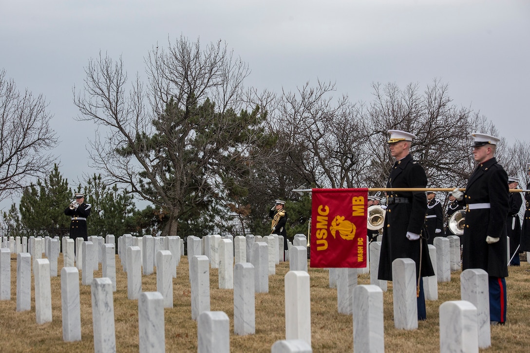 A Marine with the “The President’s Own” U.S. Marine Band plays Taps during a full honors funeral for Col. Travis M. Provost at Arlington National Cemetery, Arlington, Va., Feb. 12, 2018. Provost joined the U.S. Marine Corps on November 10, 1989 and was commissioned as a 2nd Lieutenant in April 1990. He deployed six times, supporting multiple operations including Operation Iraqi Freedom in 2005 and retired in April 2014 after a distinguished and decorated career. (Official U.S. Marine Corps photo by Sgt. Robert Knapp/Released)