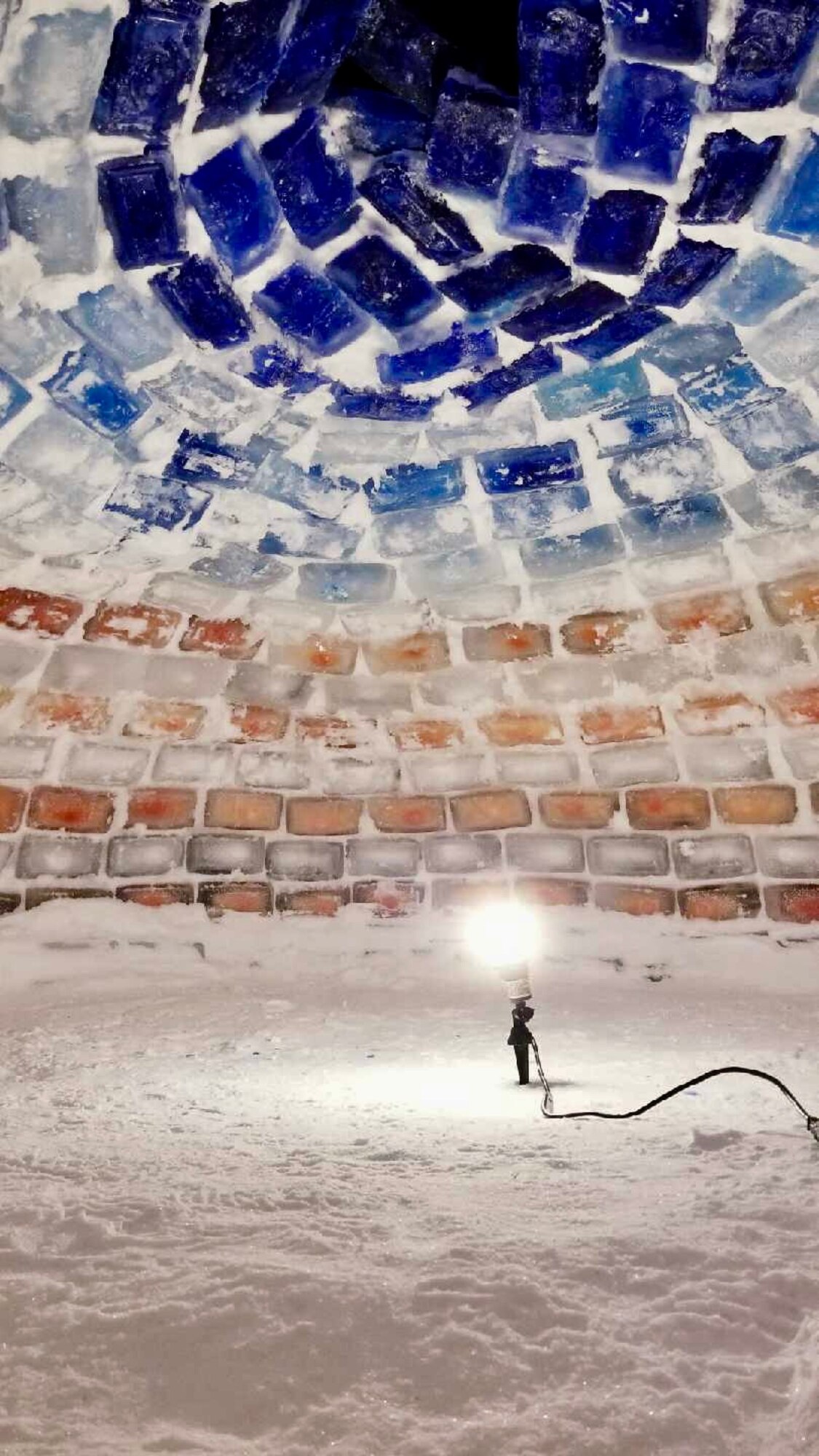 With the help of some friends, the American Flag inspired igloo was constructed between Dec. 22, 2017, and Jan. 31, 2018. The project took more than 200 man hours and 500 blocks. 

Those 500 blocks of ice were handcrafted by filling plastic tubs with water, and sometimes food coloring, then allowing it to freeze outside over the course of a day.