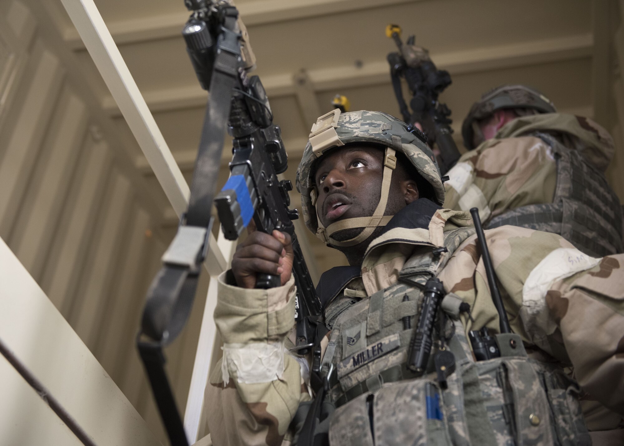 Image of Staff Sgt. Jamar Miller, 366th Security Forces Squadron response force leader, clears a building during exercise Gunslinger 18-4 at Mountain Home Air Force Base, Idaho, February 6, 2018. The base participated in a week-long exercise to train for potential real-world contingencies. (U.S. Air Force photo by Airman 1st Class Alaysia Berry)