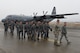 U.S. Air Force 2nd Lt. Jake Jackson, 374th Aircraft Maintenance Squadron assistant aircraft maintenance unit officer in charge, leads a Basic Maintenance Officer Tour off of the flightline after viewing the C-130J Super Hercules at Yokota Air Base, Japan, Feb. 1, 2018.