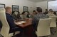 U.S. Air Force officers from across the 374th Maintenance Group partake in a presentation given by the Koku Jietai Cadets following the Basic Maintenance Officer Tour at Yokota Air Base, Japan, Feb. 1, 2018.