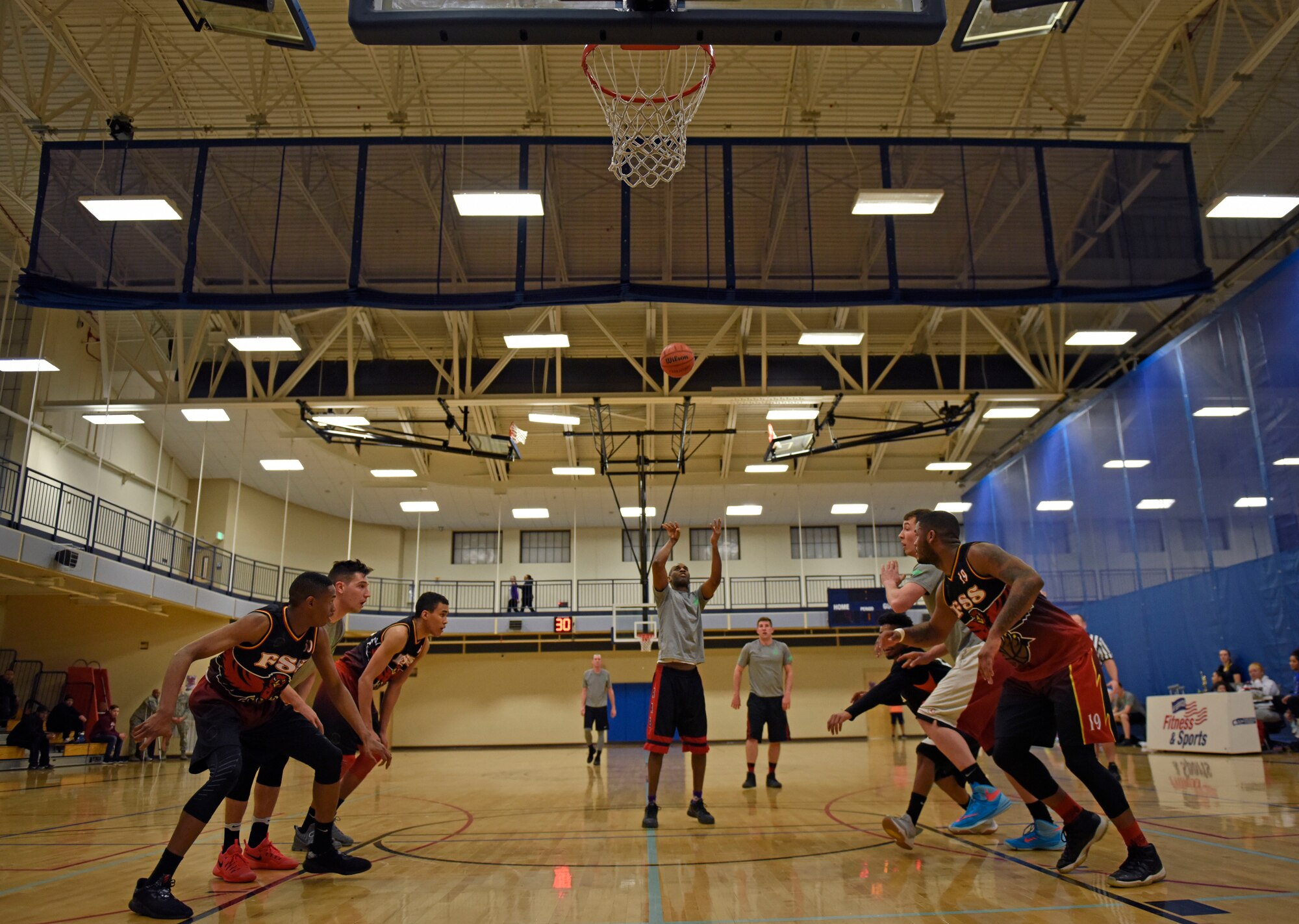 Master Sgt. Kenyatta Prince, 336th Training Group Intramural Basketball team guard, shoots a free throw during the Intramural Basketball season championship at Fairchild Air Force Base, Washington, Feb. 7, 2018.  In basketball, free throws are unopposed attempts to score points from a restricted area on the court, and are generally awarded after a foul on the shooter by the opposing team. Each successful free throw is worth one point. (U.S. Air Force photo/Airman 1st Class Jesenia Landaverde)