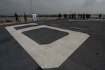 Sailors and Marines observe Laem Chebang, Thailand, from the flight deck of the amphibious assault ship USS Bonhomme Richard (LHD 6) for a scheduled port visit before beginning Cobra Gold 2018 (CG18). Cobra Gold, a Thai-U.S. co-sponsored exercise in its 37th iteration, is designed to advance regional security and ensure effective responses to regional crises by bringing together a robust multinational force to address shared goals and security commitments in the Indo-Asia-Pacific region. Bonhomme Richard is operating in the Indo-Asia-Pacific region as part of a regularly scheduled patrol and provides a rapid-response capability in the event of a regional contingency or natural disaster.