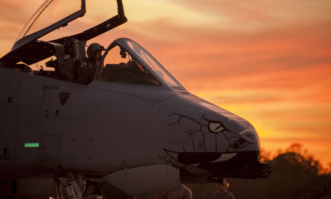 An A-10C Thunderbolt II “Warthog” pilot from the 163rd Fighter Squadron, and crew chiefs from the 122nd Fighter Wing prepare for takeoff during Operation Guardian Blitz, Jan. 23, 2018, at MacDill Air Force Base, Fla. Guardian Blitz is a two-week joint exercise to improve service interoperability for combat search and rescue and close air support. (U.S. Air National Guard photo by Staff Sgt. William Hopper/Released)