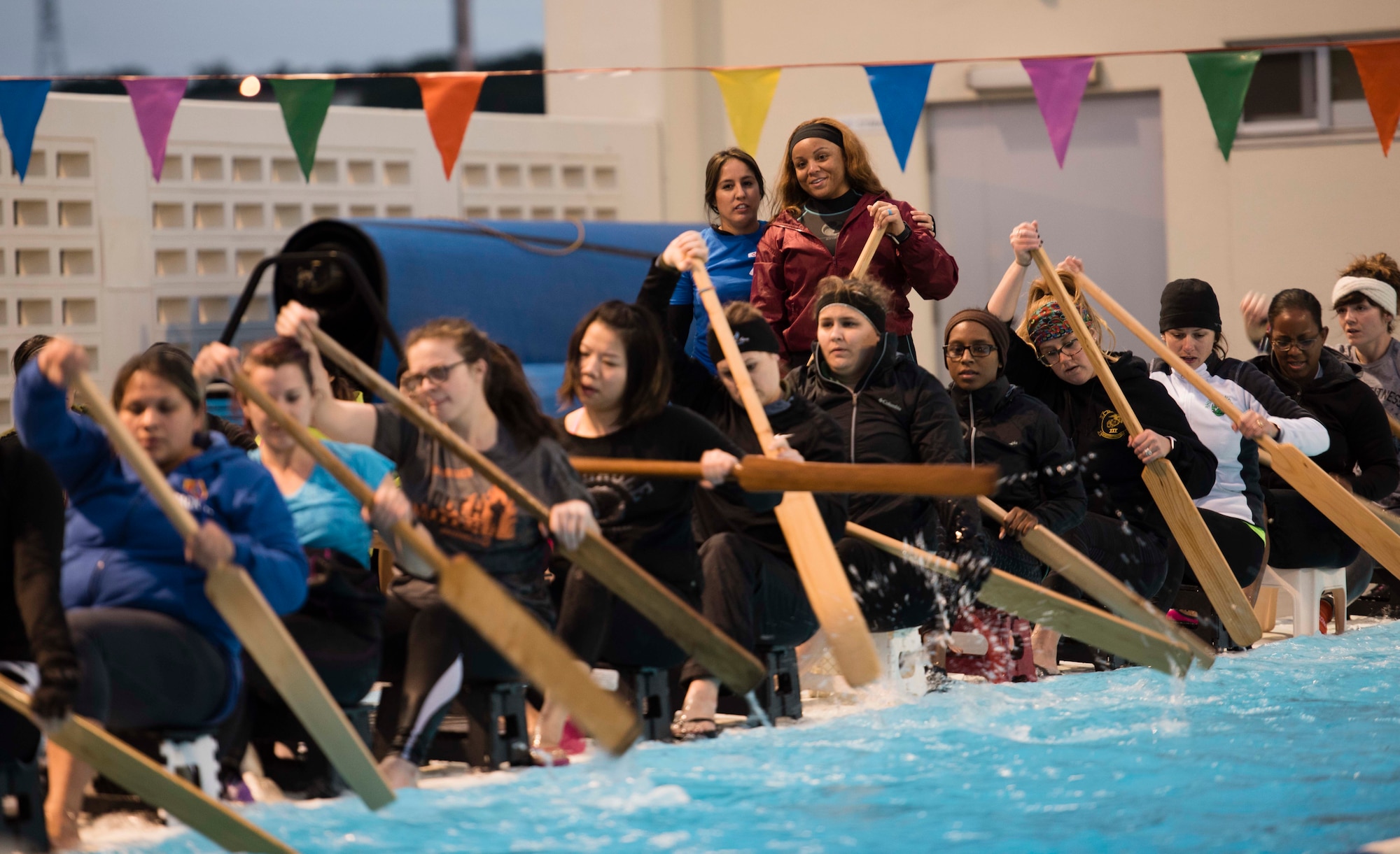 The Kadena Shoguns Women’s Dragon Boat team practice at the Fairchild Pool Feb. 7, 2018, at Kadena Air Base, Japan. The Naha Dragon Boat Race is the largest dragon boat race on Okinawa, with more than 50 competing teams. (U.S. Air Force photo by Senior Airman Omari Bernard)