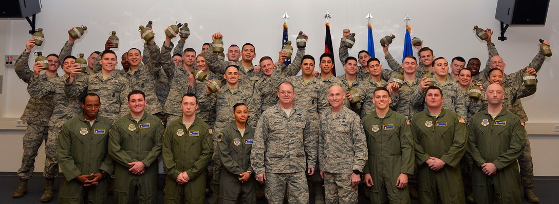 Graduates of the Phoenix Raven Qualification Course pose for a class photo with their instructors and and leadership on Ramstein Air Base, Germany, on Feb. 12, 2018. U.S. Air Forces in Europe-Air Forces Africa and 86th Airlift Wing leadership requested a mobile training team to come and direct the Raven course at Ramstein. (U.S. Air Force photo by Senior Airman Joshua Magbanua)