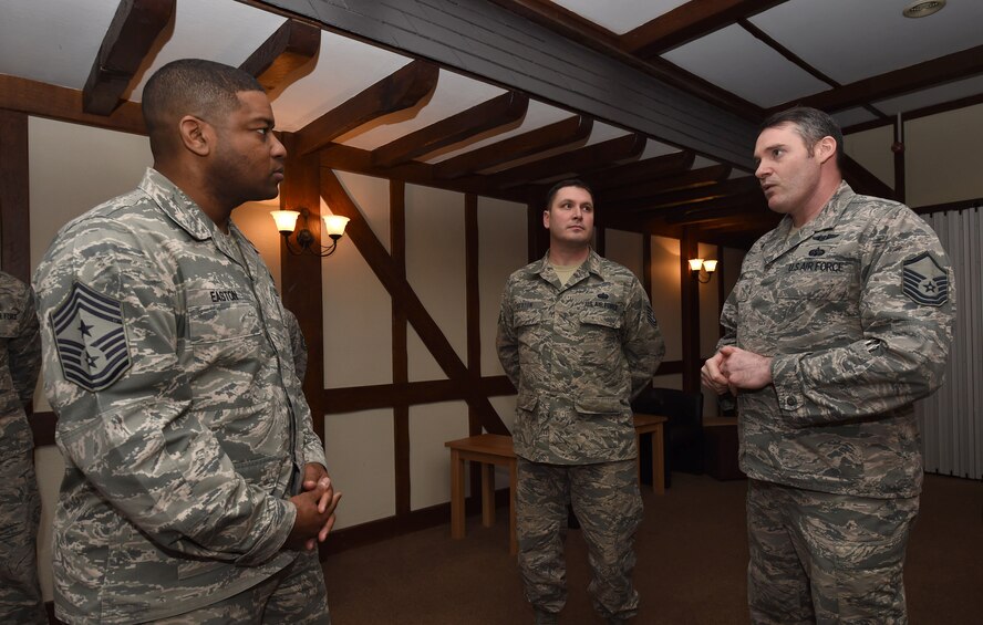 U.S. Air Force Chief Master Sgt. Phillip L. Easton, U.S. Air Forces in Europe and U.S. Air Forces Africa Command Chief Master Sgt., visits with Airmen from the 501st Combat Support Wing at RAF Alconbury, Feb. 7, 2017. CMSgt Easton had the opportunity to speak with Airmen and visit several of 501st CSW geographically seperated units across England. (U.S. Air Force photo by Tech Sgt Brian Kimball)