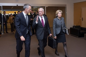 Defense Secretary James N. Mattis walks with NATO leaders in Brussels.