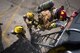 Firefighters assigned to the 332d Expeditionary Civil Engineer Squadron ascend a ladder to the cockpit of an F-15E Strike Eagle during emergency egress training February 14, 2018 in Southwest Asia. The exercise tested the team’s ability to evacuate an aircrew quickly while accounting for special hazards associated with military aircraft. (U.S. Air Force photo by Staff Sgt. Joshua Kleinholz)