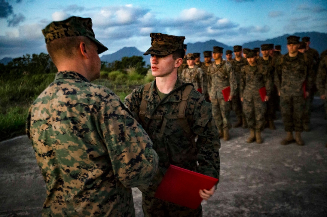 Marines receive certificates.